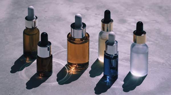 Editorial illustration for Fermented Skincare, Explained: How Microbes Turn Big Molecules Into Skin-Ready Actives
